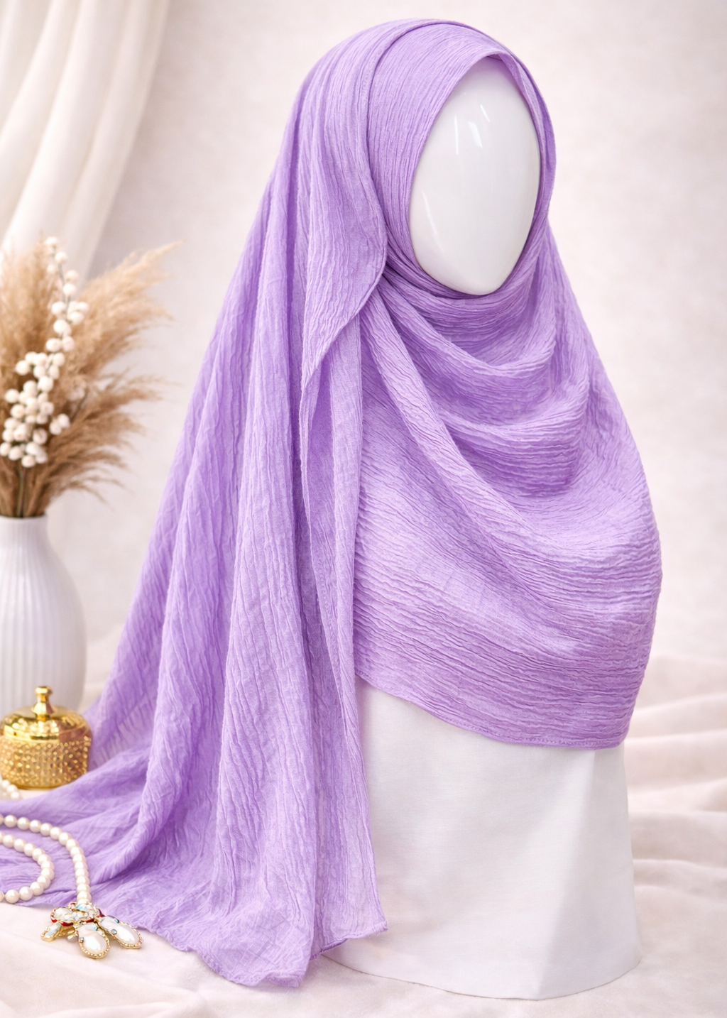 Lavender hijab on a mannequin with a neutral background