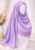 Lavender hijab on a mannequin with a neutral background
