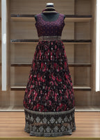 Patterned dress on a mannequin against a wooden panel background