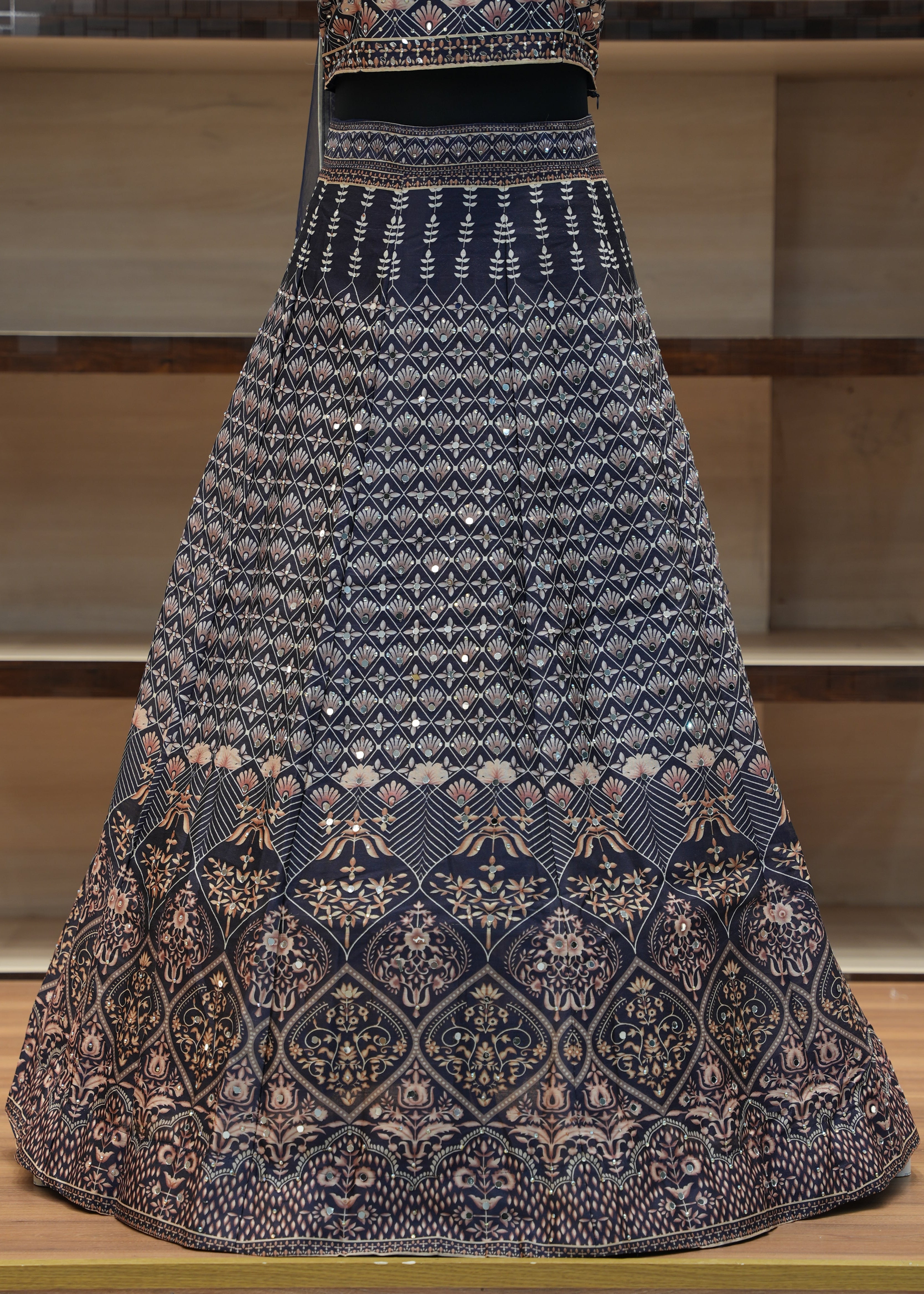 Decorative tablecloth with intricate patterns on a wooden chair.
