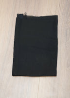 Black fabric on a wooden surface