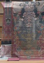 Decorative fabric with intricate patterns on a wooden surface