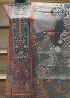 Decorative fabric with intricate patterns in shades of purple, green, and gray.