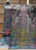 Colorful patterned fabric on a wooden hanger against a wooden background
