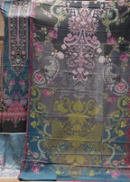 Colorful fabric with intricate patterns draped over a wooden surface