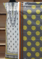 Two pieces of fabric with different patterns stacked on top of each other.