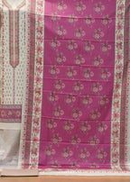 Purple floral patterned fabric draped over a chair with a white border.