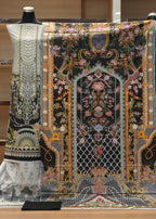 Decorative fabric with intricate patterns on a mannequin against a neutral background