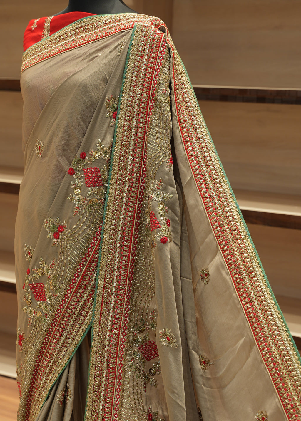 Decorative fabric with intricate patterns on a wooden chair