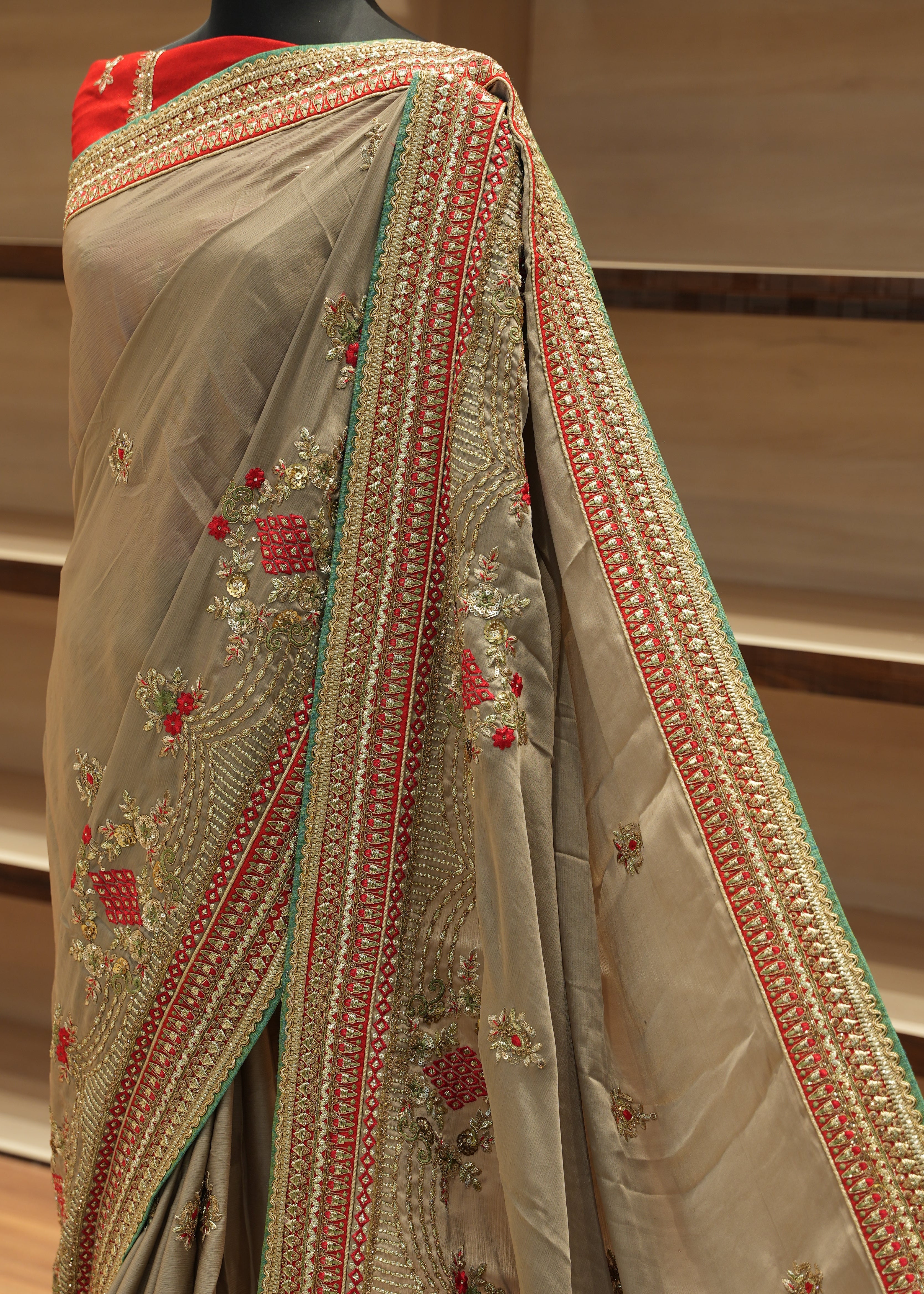 Decorative fabric with intricate patterns on a wooden chair