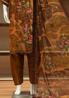 Mannequin wearing a traditional outfit with floral patterns on a wooden floor.