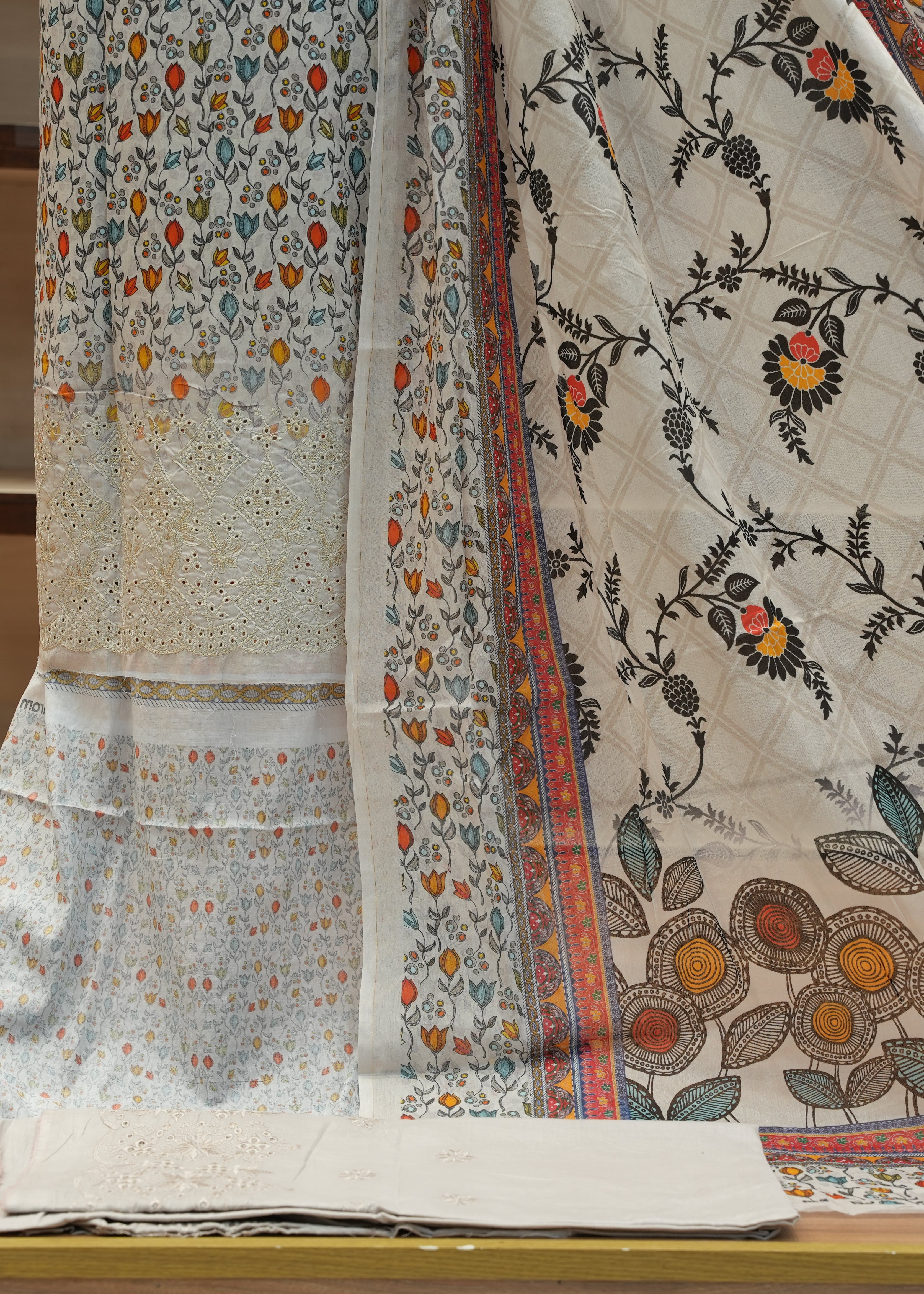 Floral patterned fabric on a wooden surface