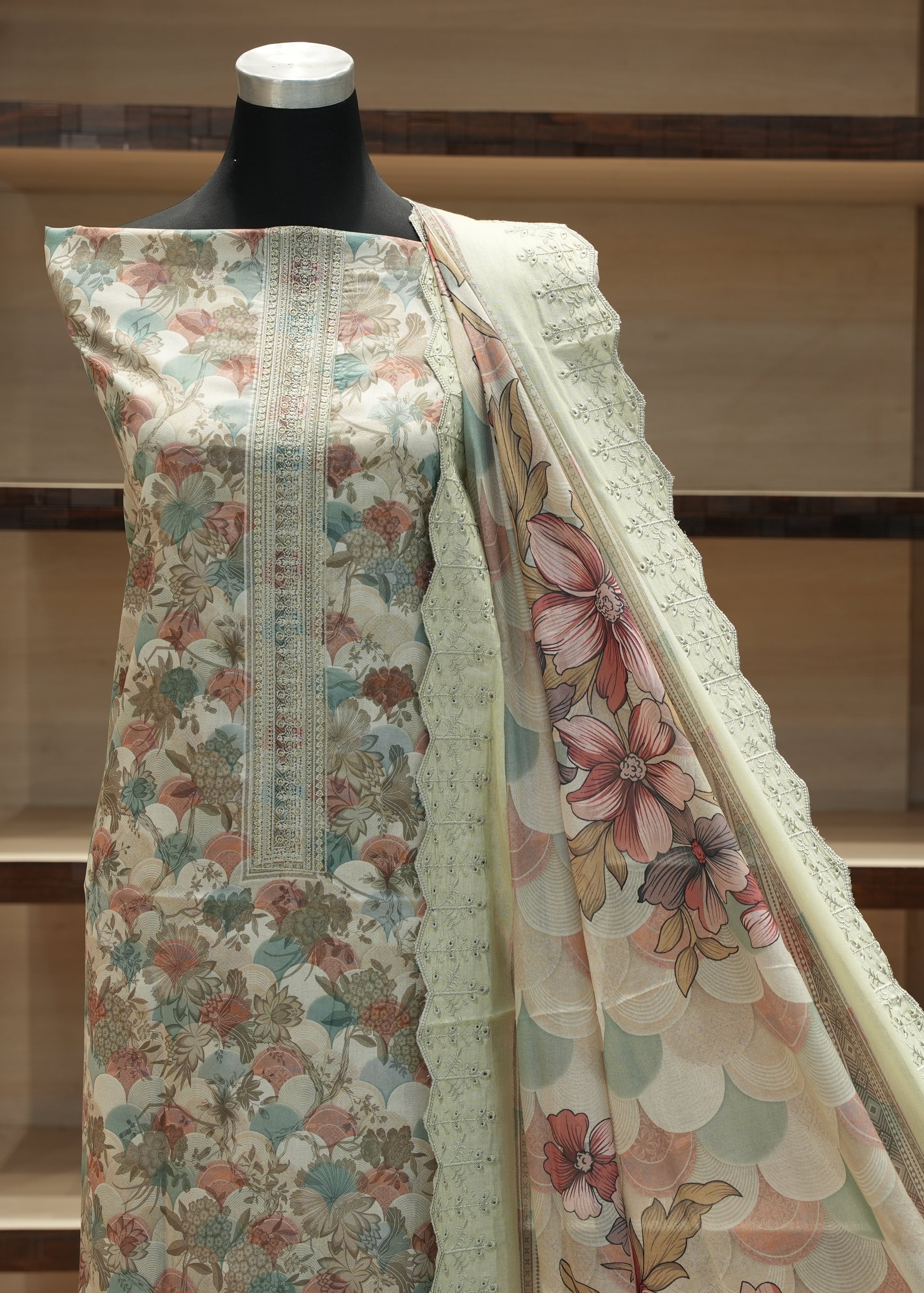 Floral patterned fabric on a mannequin against a neutral background