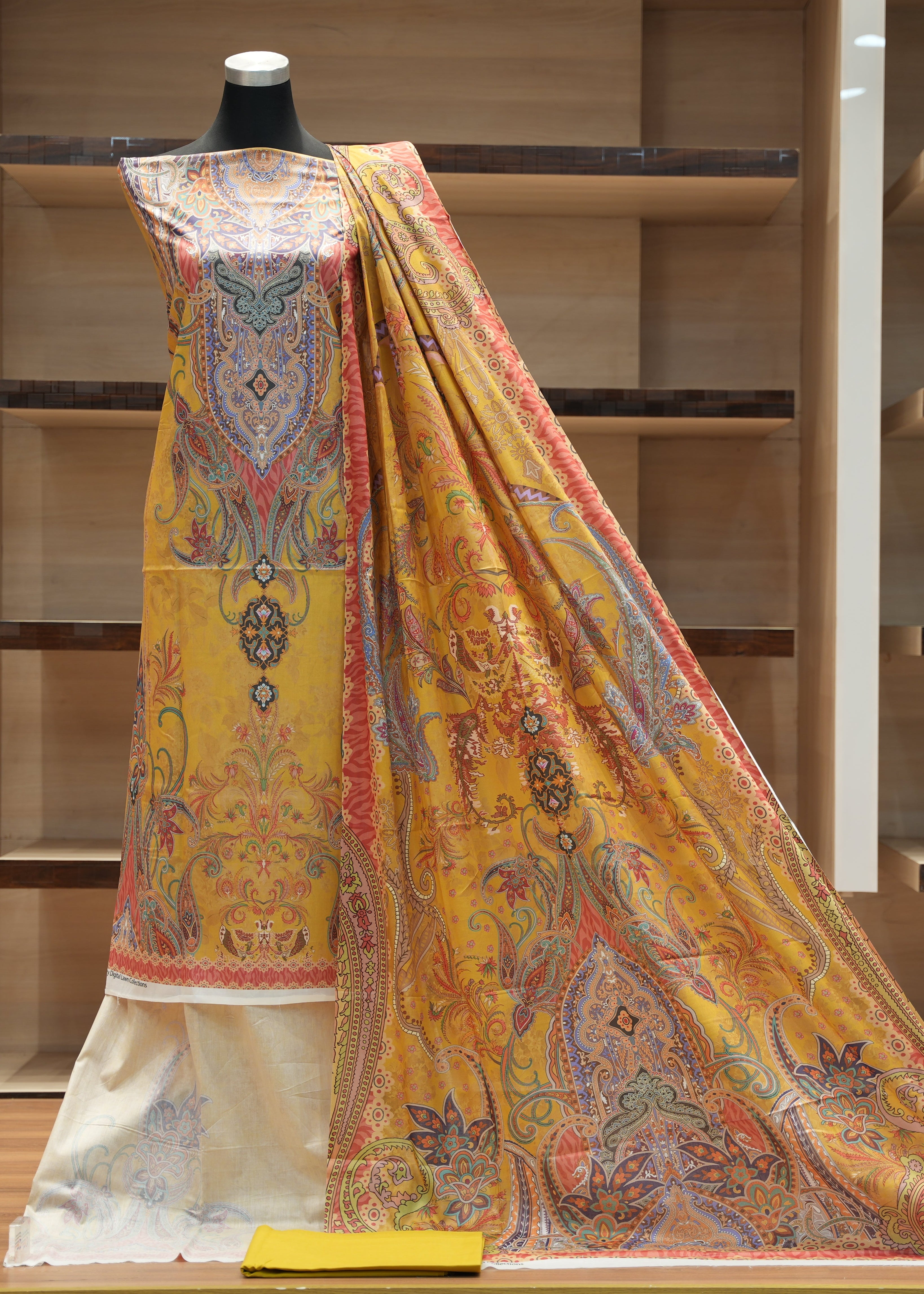 Colorful traditional outfit on a mannequin with a wooden shelf background