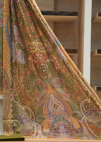 Colorful patterned fabric draped over a surface with a neutral background