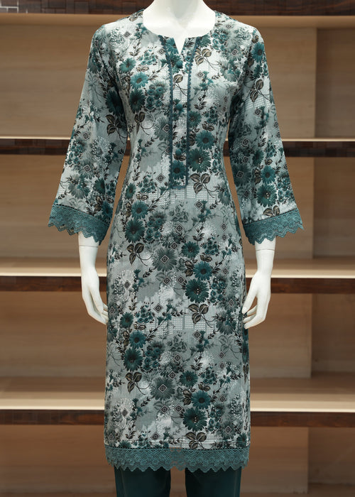 Floral patterned dress on a mannequin against a wooden shelf background