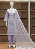 Mannequin wearing a lavender traditional outfit with a white embroidered dupatta against a wooden shelf background.