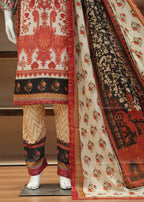 Traditional embroidered outfit with a shawl on a mannequin against a neutral background