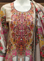 Embroidered traditional outfit with a shawl on a mannequin against a neutral background