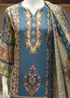 Decorative traditional garment with intricate patterns on a mannequin.