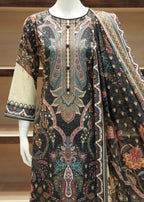 Traditional embroidered garment on a mannequin against a neutral background