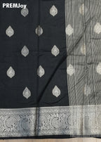 Black saree with silver embroidery and a visible brand name 'PREMJoy'.