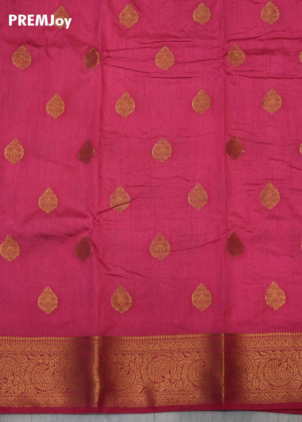 Pink fabric with gold patterns and a brand name 'PREMJoy' at the top.